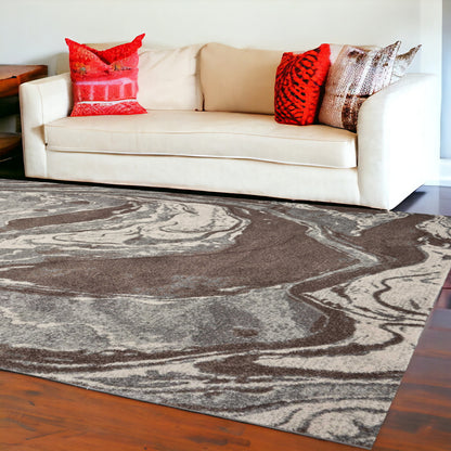 5' X 8' Brown And Ivory Abstract Area Rug