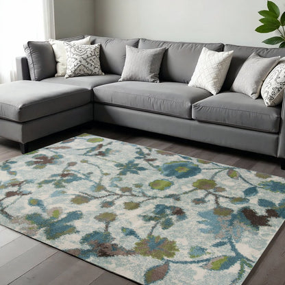 8' X 11' Teal Blue White And Green Floral Vines Area Rug