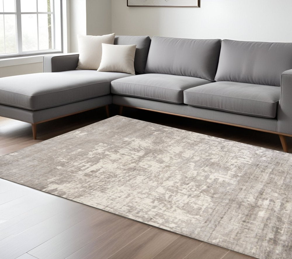 9' X 13' Beige And Ivory Abstract Hand Loomed Area Rug