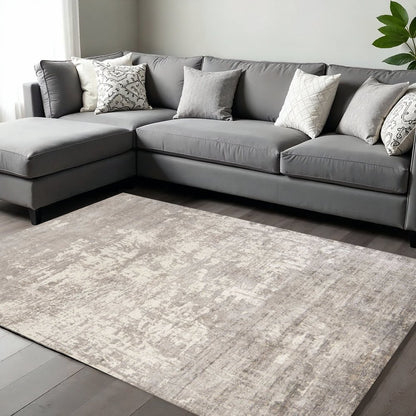 9' X 13' Beige And Ivory Abstract Hand Loomed Area Rug