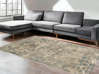 5' X 7' Beige And Blue Floral Medallion Hand Loomed Area Rug