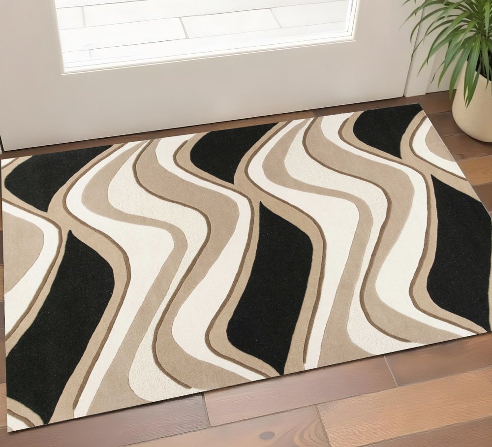 5' X 8' Beige Ivory And Black Wool Abstract Hand Tufted Area Rug