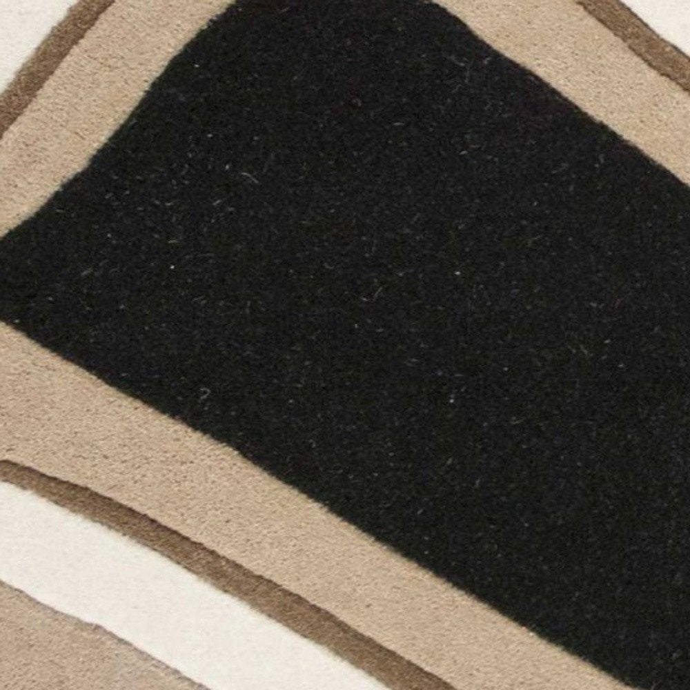 5' X 8' Beige Ivory And Black Wool Abstract Hand Tufted Area Rug