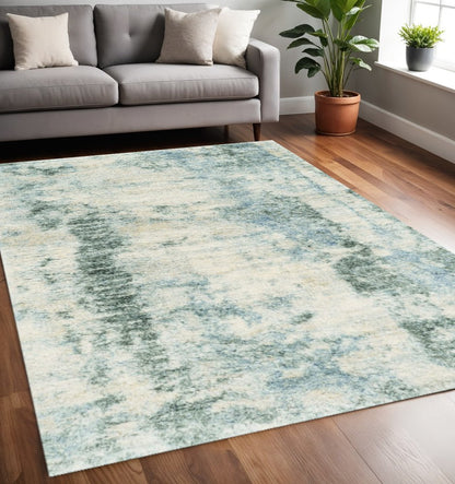 8' X 10' Ivory And Blue Abstract Area Rug