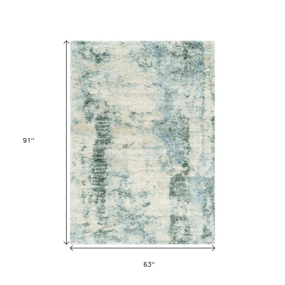 8' X 10' Ivory And Blue Abstract Area Rug