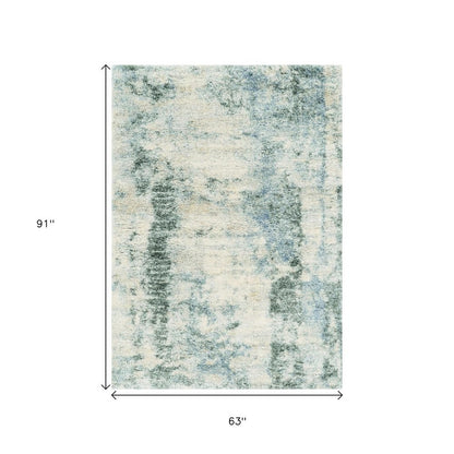 8' X 10' Ivory And Blue Abstract Area Rug