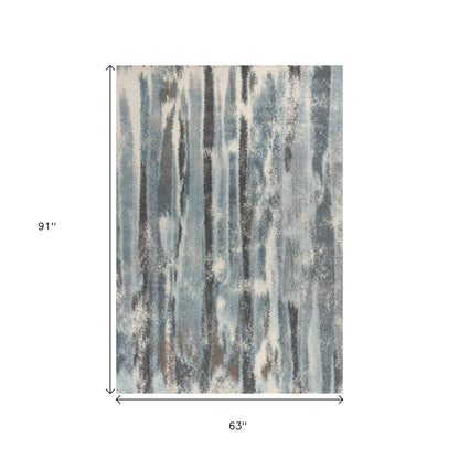 7' X 10' Teal Blue And White Abstract Distressed Area Rug
