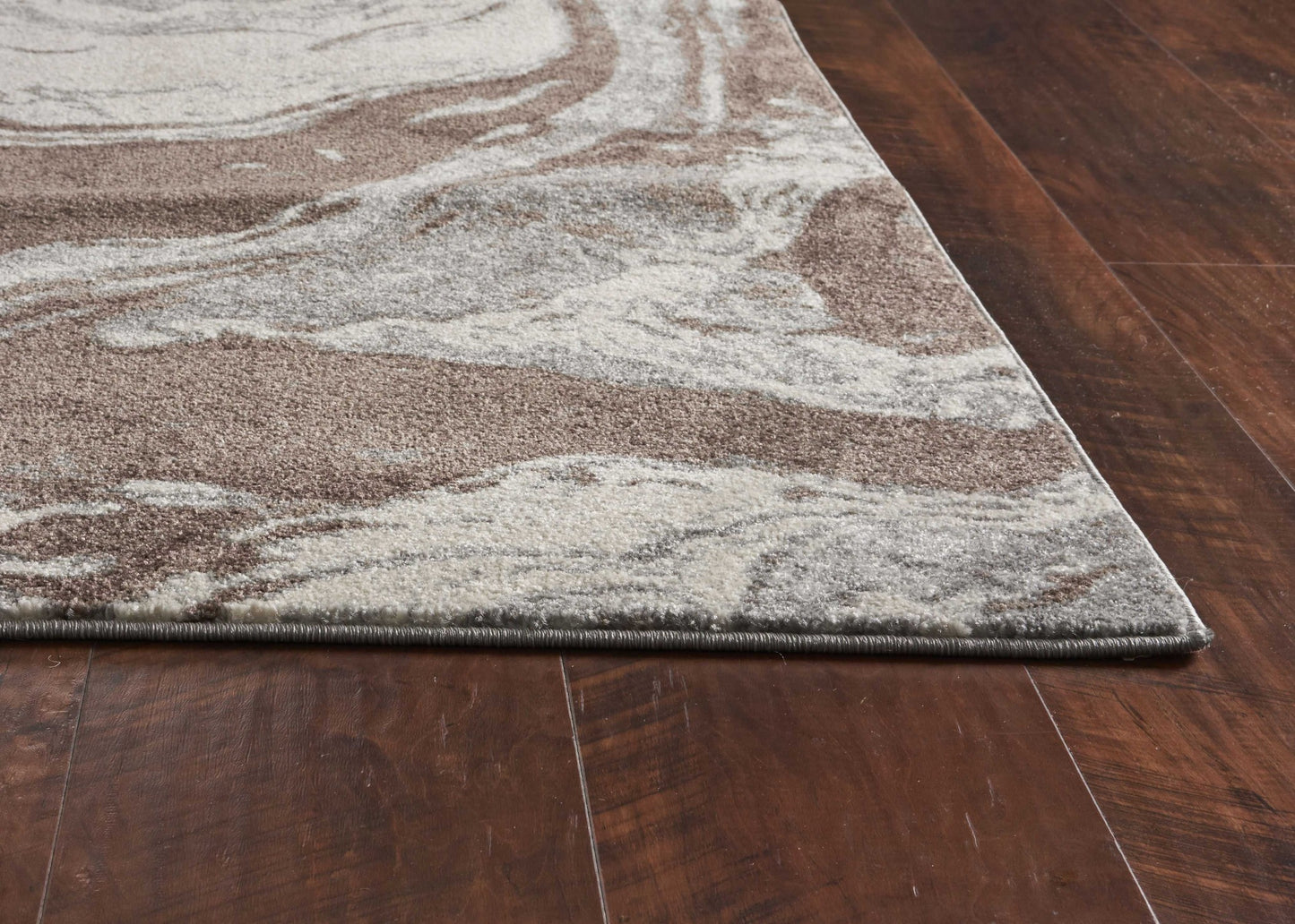 5' X 8' Brown And Ivory Abstract Area Rug