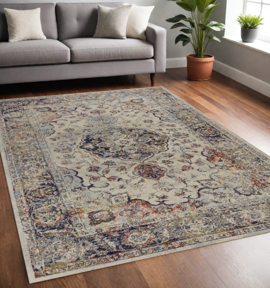 5' X 8' Ivory Blue And Orange Medallion Area Rug