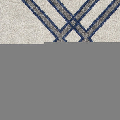 7' X 10' Ivory and Blue Geometric Indoor Outdoor Area Rug
