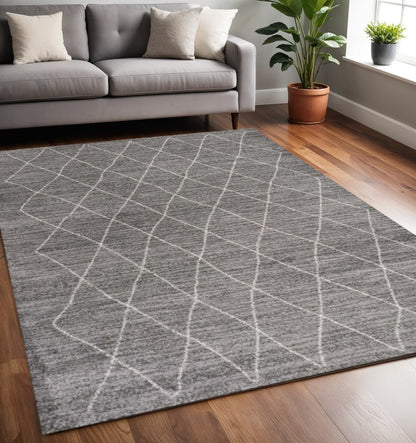 5' X 8' Gray And Ivory Geometric Area Rug