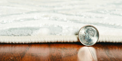 5' X 8' Sand And Light Blue Geometric Area Rug