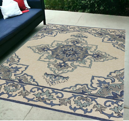 5' X 8' Ivory And Blue Damask Indoor Outdoor Area Rug