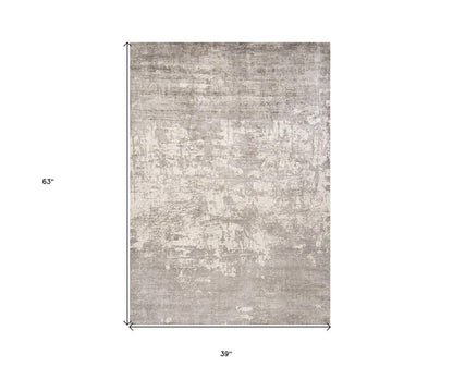 9' X 13' Beige And Ivory Abstract Hand Loomed Area Rug