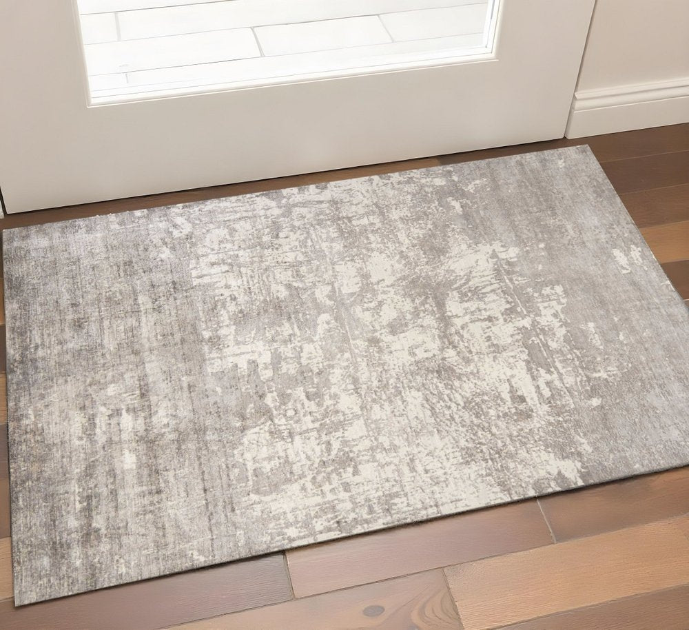 9' X 13' Beige And Ivory Abstract Hand Loomed Area Rug