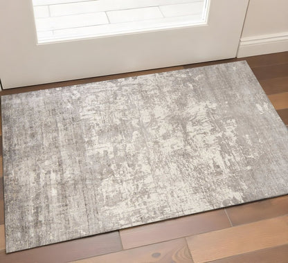 9' X 13' Beige And Ivory Abstract Hand Loomed Area Rug