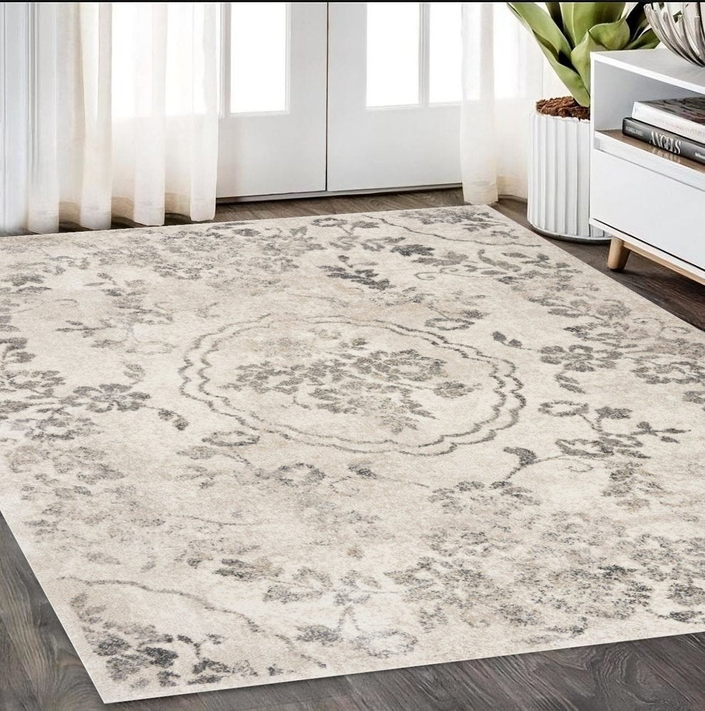 8' X 10' Gray And Tan Floral Distressed Area Rug