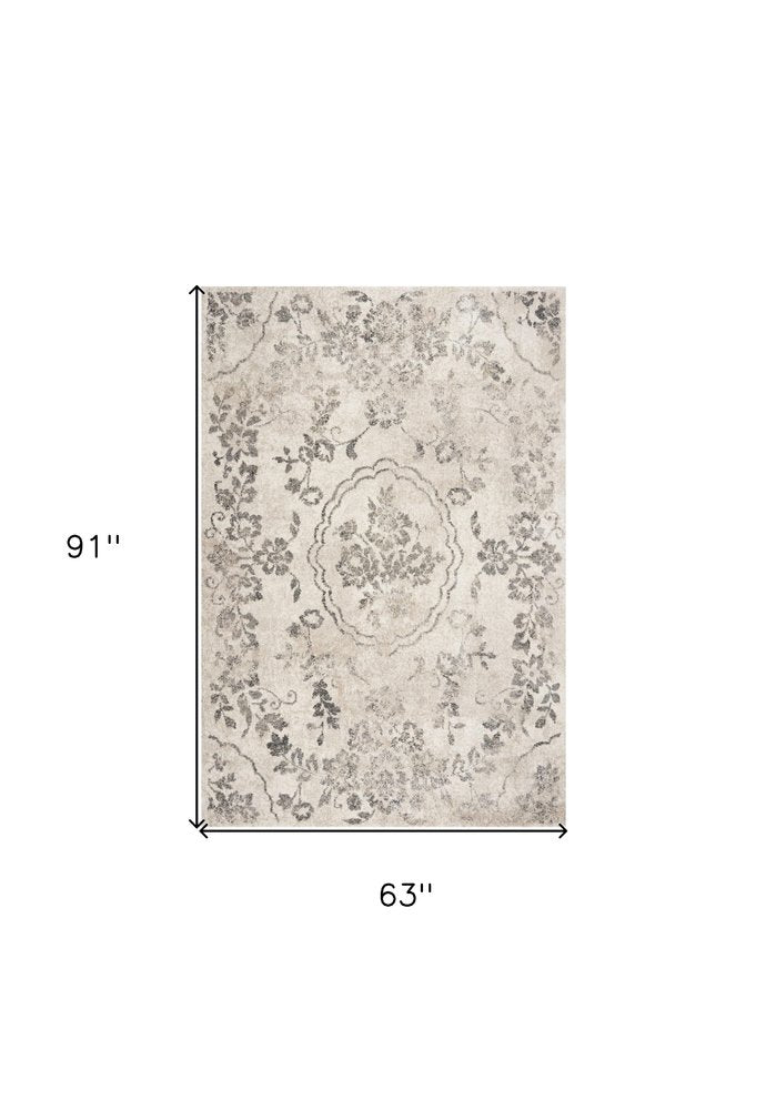 8' X 10' Gray And Tan Floral Distressed Area Rug