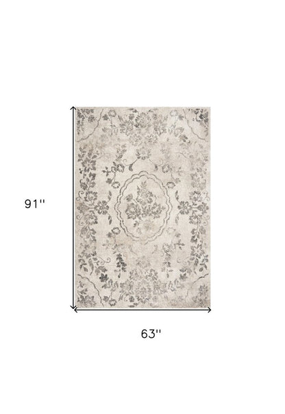 8' X 10' Gray And Tan Floral Distressed Area Rug