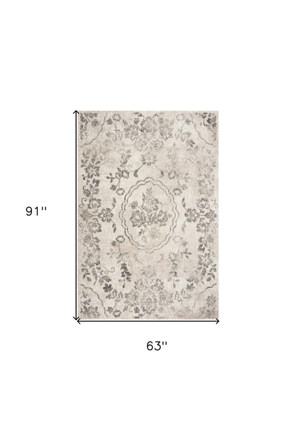 8' X 10' Gray And Tan Floral Distressed Area Rug