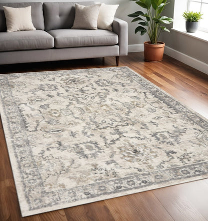 9' X 13' Ivory And Gray Floral Medallion Distressed Area Rug