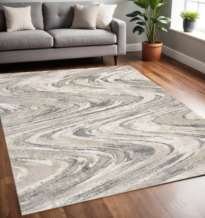 9' X 13' Gray And Tan Abstract Area Rug