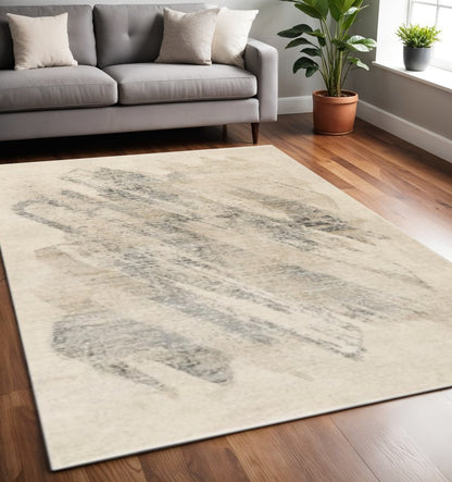 5' X 8' Ivory And Gray Abstract Area Rug