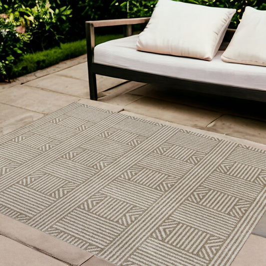5' X 8' Beige And Ivory Geometric Indoor Outdoor Area Rug