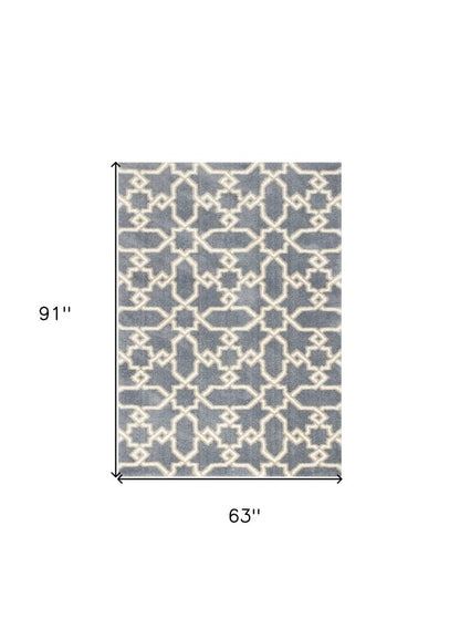 7' X 10' Slate Blue And Ivory Geometric Area Rug