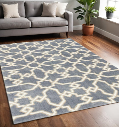 7' X 10' Slate Blue And Ivory Geometric Area Rug