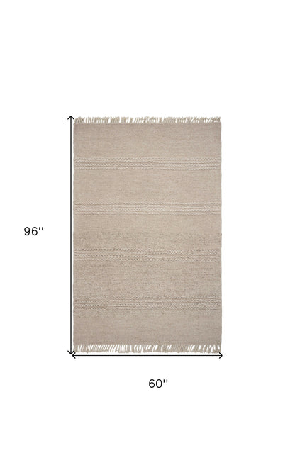 5' X 8' Natural Plain Wool Indoor Area Rug With Fringe