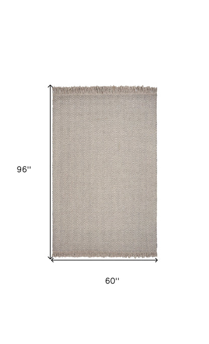 5' X 8' Oatmeal Beige Hand Woven Houndstooth Indoor Area Rug