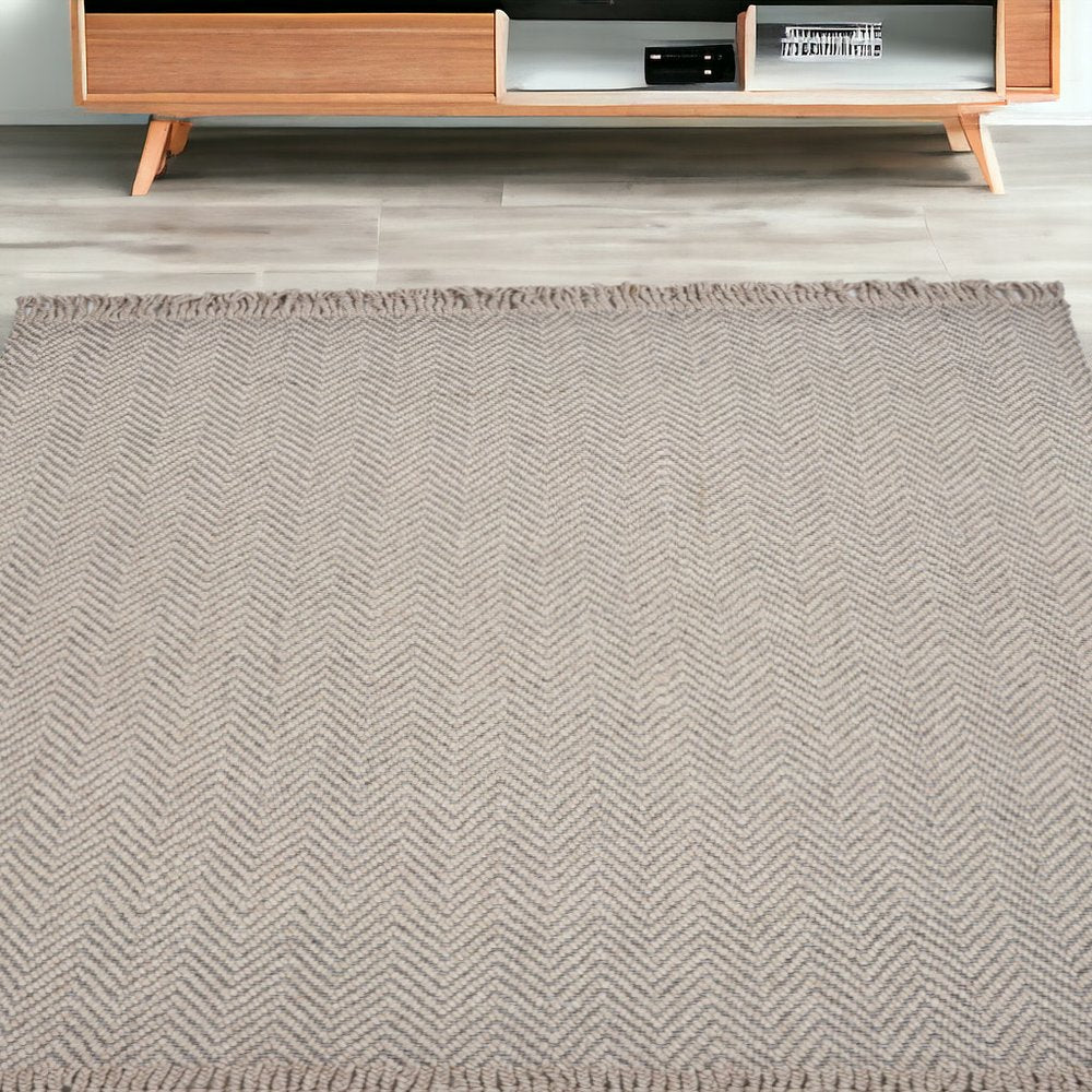 5' X 8' Beige And Gray Wool Chevron Hand Woven Area Rug