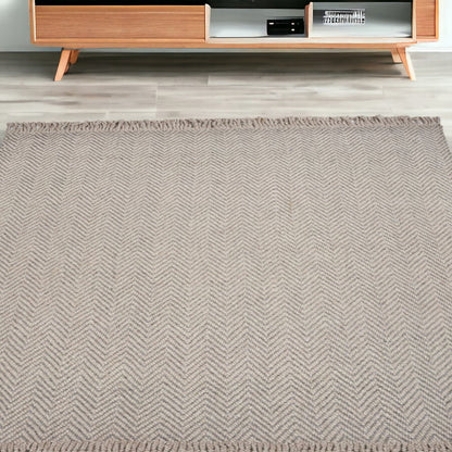5' X 8' Beige And Gray Wool Chevron Hand Woven Area Rug