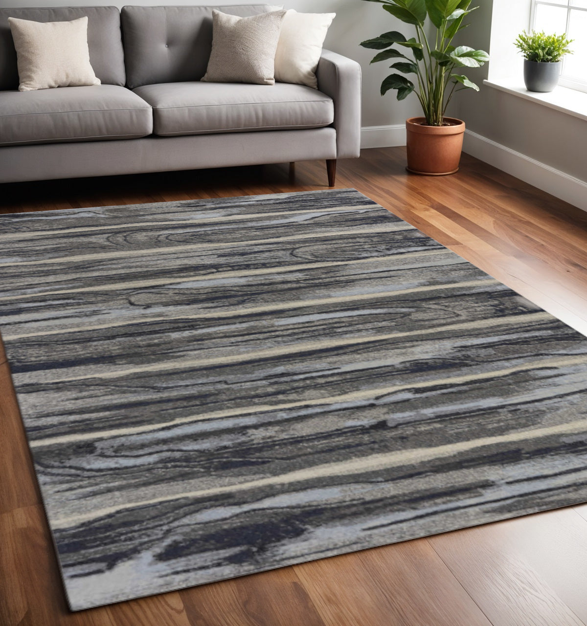 8' X 11' Gray Blue And Black Abstract Area Rug