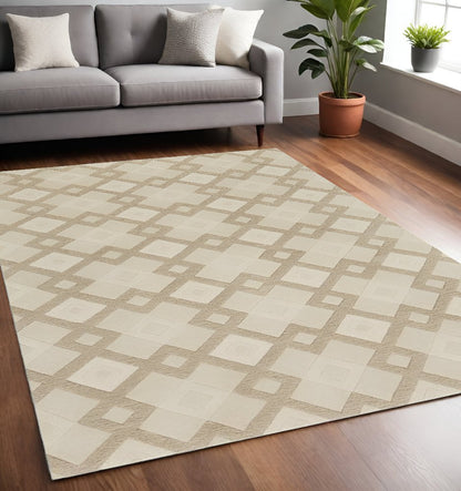 5' X 8' Ivory And Brown Wool Geometric Hand Tufted Area Rug