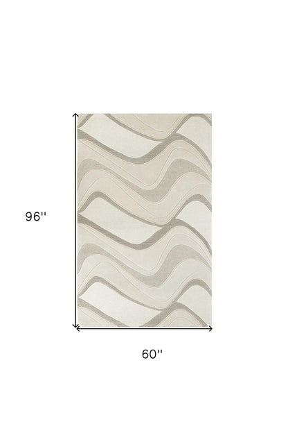 5' X 8' Ivory Hand Tufted Abstract Waves Indoor Area Rug