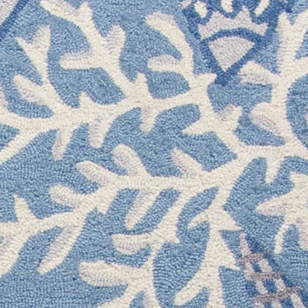 5' X 8' Blue Gray And White Fish and Coral Hand Tufted Area Rug