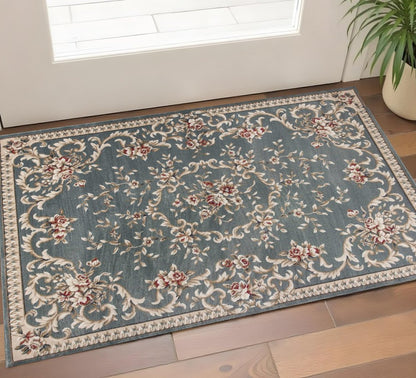 5' X 8' Slate Blue Red And Ivory Floral Medallion Area Rug