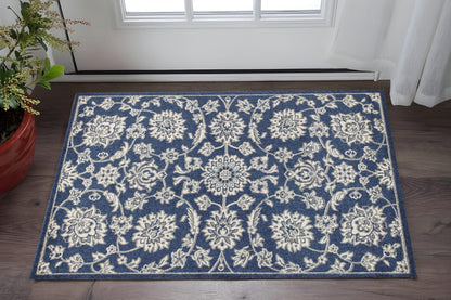 5' X 8' Blue And Ivory Floral Medallion Area Rug