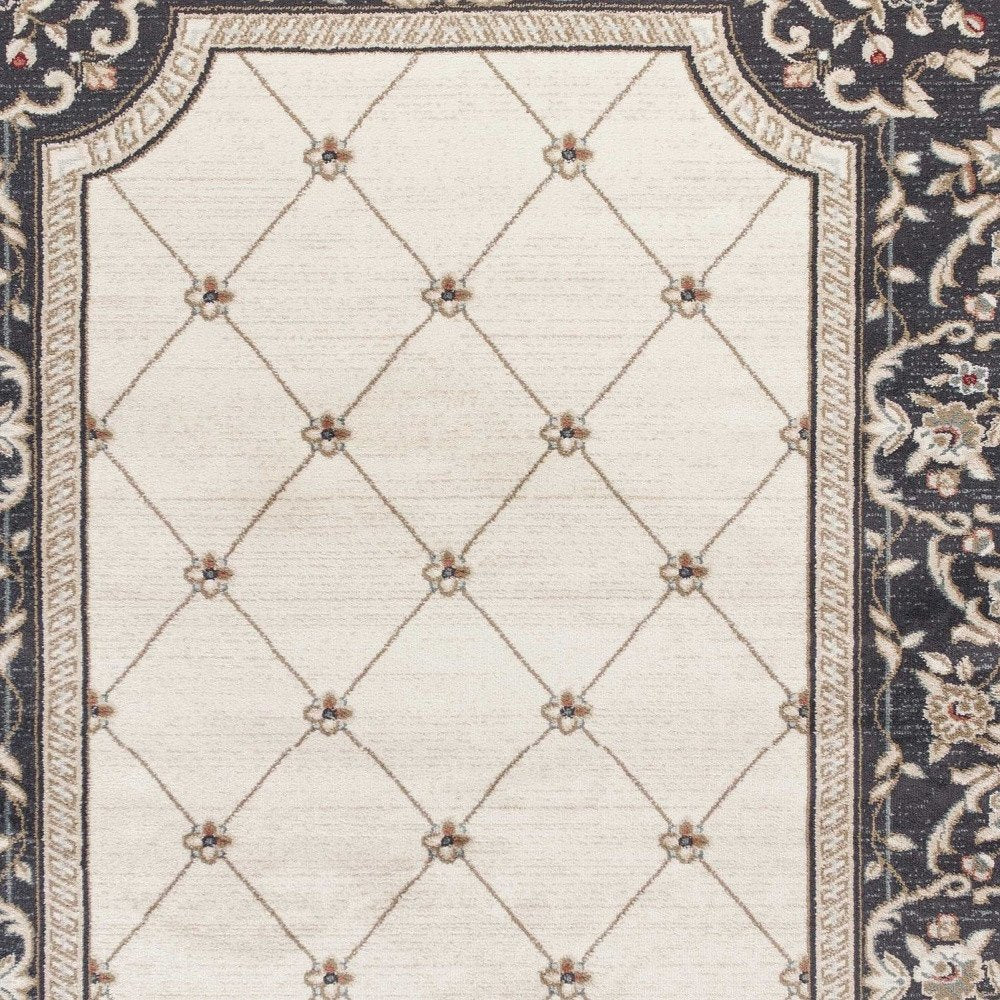 5' X 8' Ivory And Gray Floral Area Rug