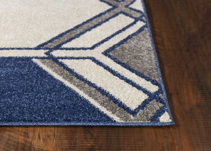 3' X 5' Blue Ivory And Gray Geometric Area Rug