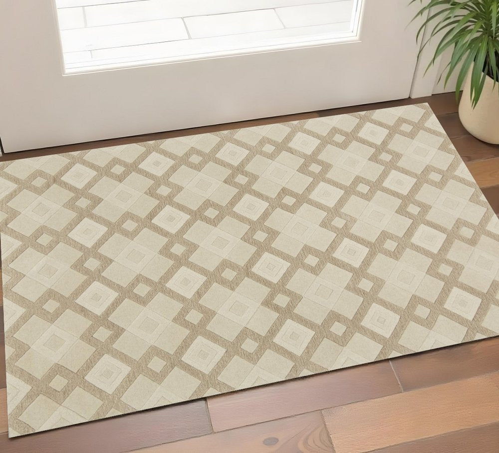 2' X 4' Ivory And Brown Wool Geometric Hand Tufted Area Rug