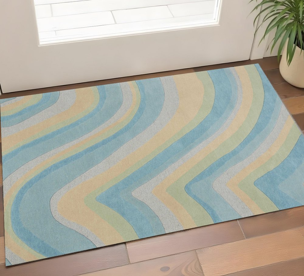 2' X 4' Blue Beige And Green Wool Abstract Hand Tufted Area Rug