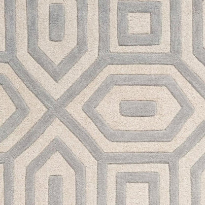 2' X 4' Gray And Ivory Wool Geometric Hand Tufted Area Rug
