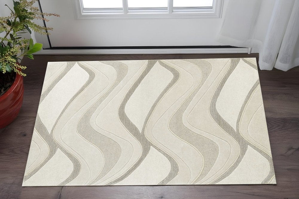 2' X 4' Ivory And Gray Wool Abstract Hand Tufted Area Rug