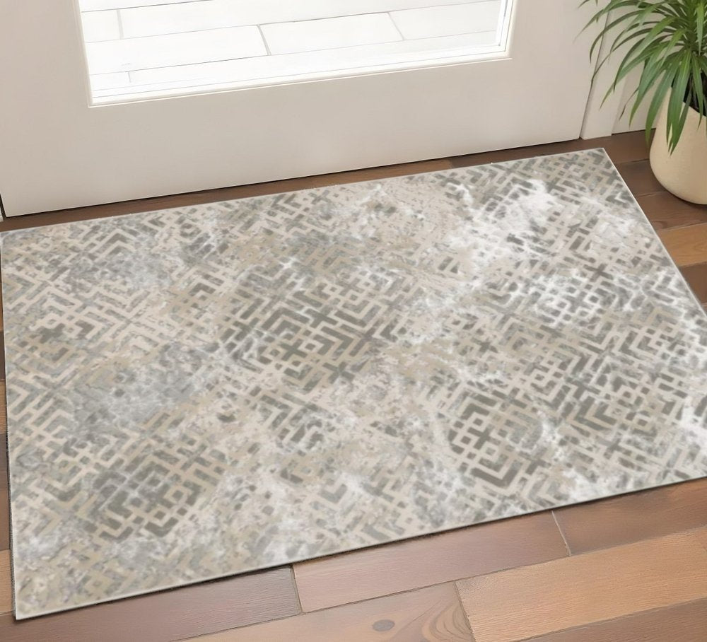 3' X 5' Sand And Light Blue Geometric Distressed Area Rug