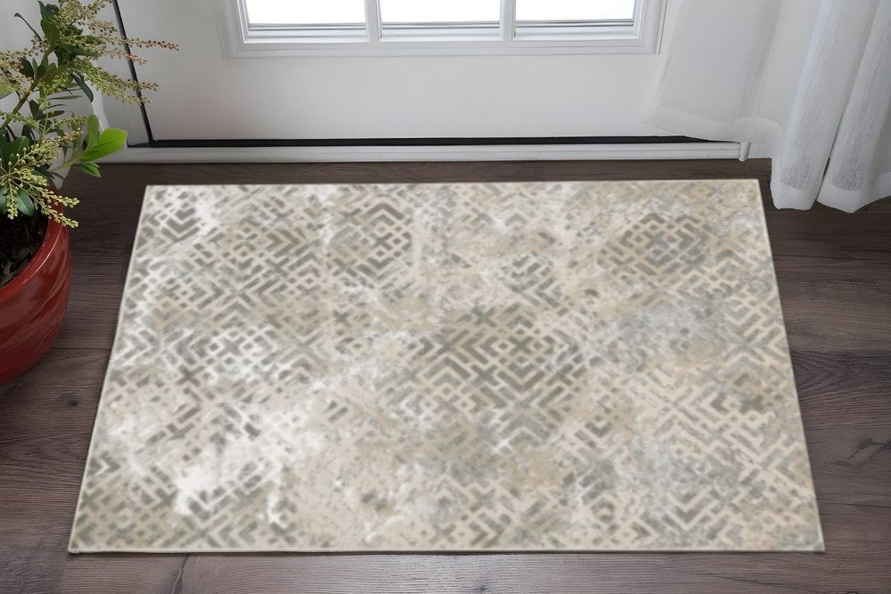 3' X 5' Sand And Light Blue Geometric Distressed Area Rug