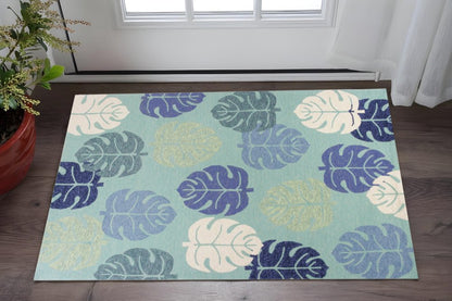 7' Turquoise And Ivory Botanical Leaves Hand Tufted Round Rug