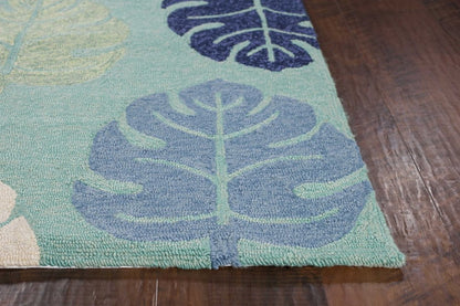 7' Turquoise And Ivory Botanical Leaves Hand Tufted Round Rug